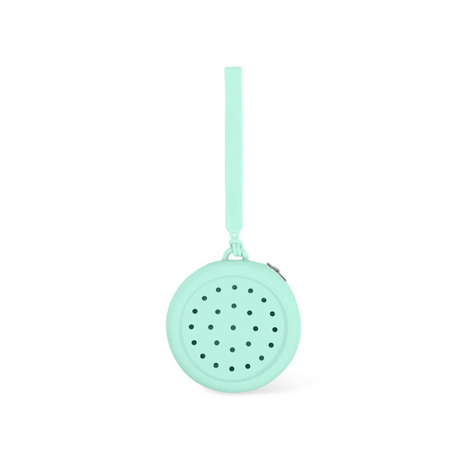 A round mint green silicone pouch with holes and a strap, featuring a zip closure and a logo.