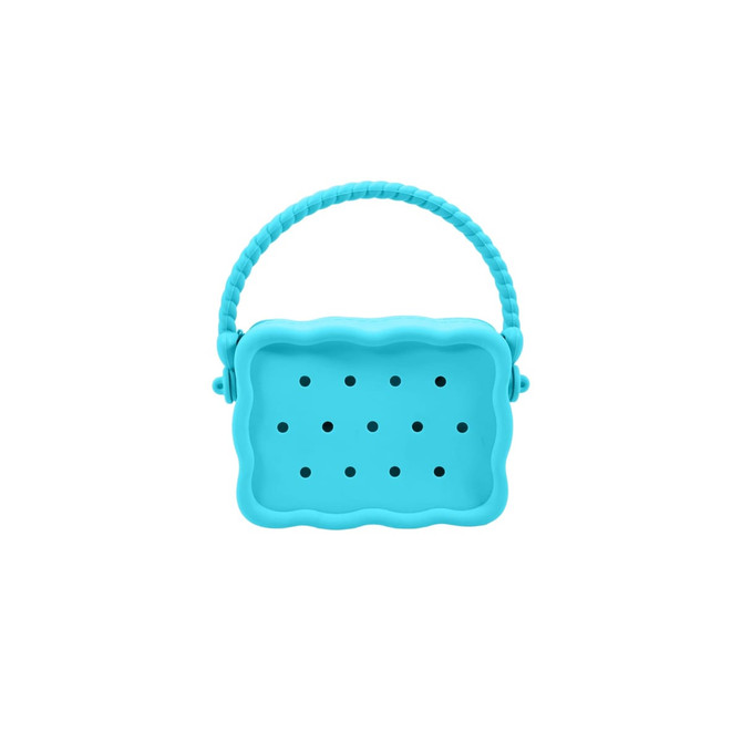 A turquoise silicone bag with a textured handle and holes, featuring a scalloped design.
