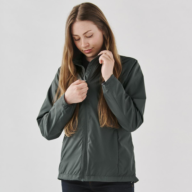 A women’s full zip rain jacket in dark grey, featuring a zippered front and a subtle logo.