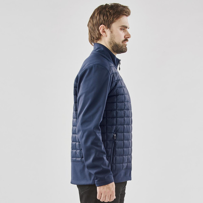 Men's thermal softshell jacket in navy, featuring a quilted design and a zipped pocket, with a branding logo.