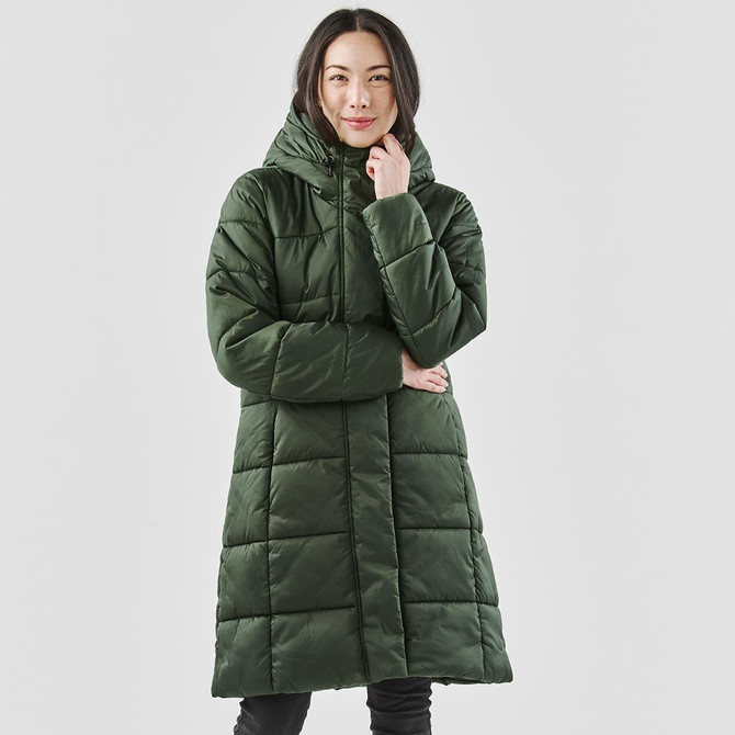 A long, green puffer jacket featuring a hood and a quilted design, presented on a model.