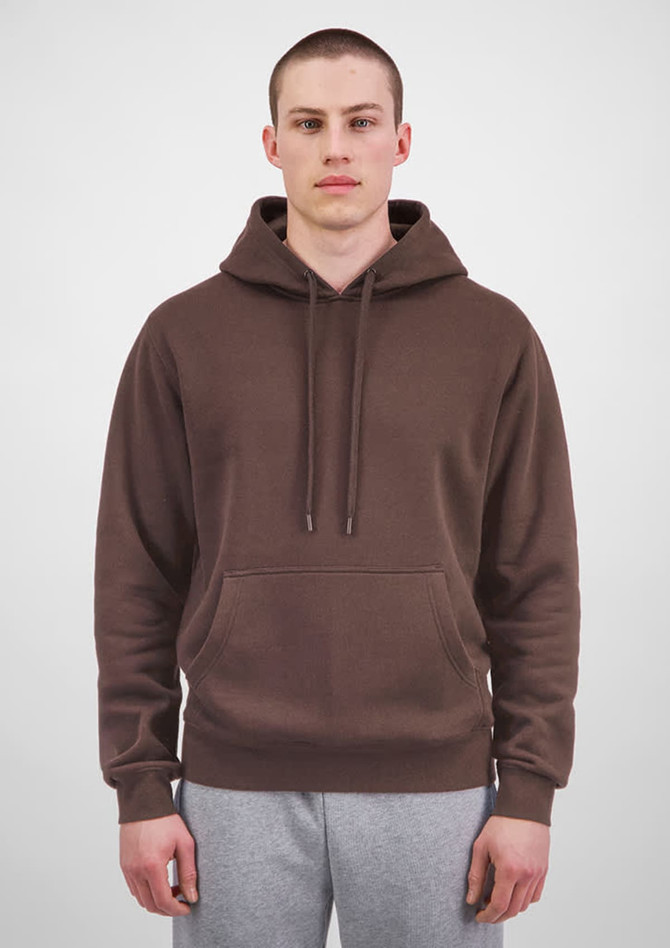 A brown men's hoodie featuring a front pocket and drawstring hood, worn by a male model.
