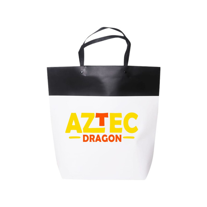 A large black and white boutique paper bag with handles and a logo in vibrant colours.