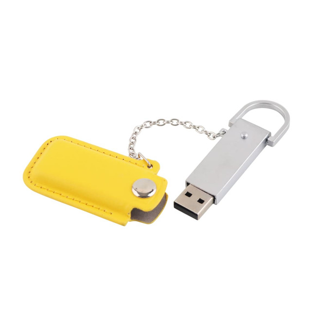 A yellow leather pouch containing a silver flash drive, connected by a chain.