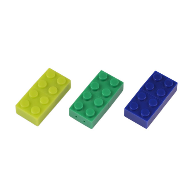 A collection of three brick-shaped flash drives in yellow, green, and blue, featuring a logo on one drive.