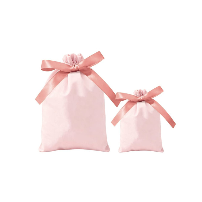 Two pink ribbon drawstring gift bags, one large and one small, tied with satin ribbons.
