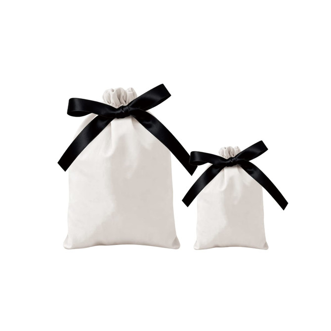 Two cream drawstring gift bags with black ribbon bows, one larger and one smaller, both featuring a logo.