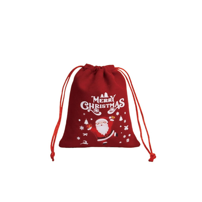 A red drawstring gift bag featuring a Christmas design with Santa, snowflakes, and stars. It has a festive look.