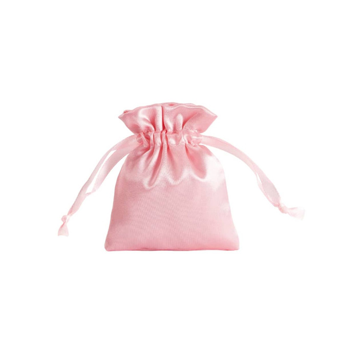 A pink silk satin drawstring bag with ribbon ties at the top and a smooth, shiny finish. It has a logo.