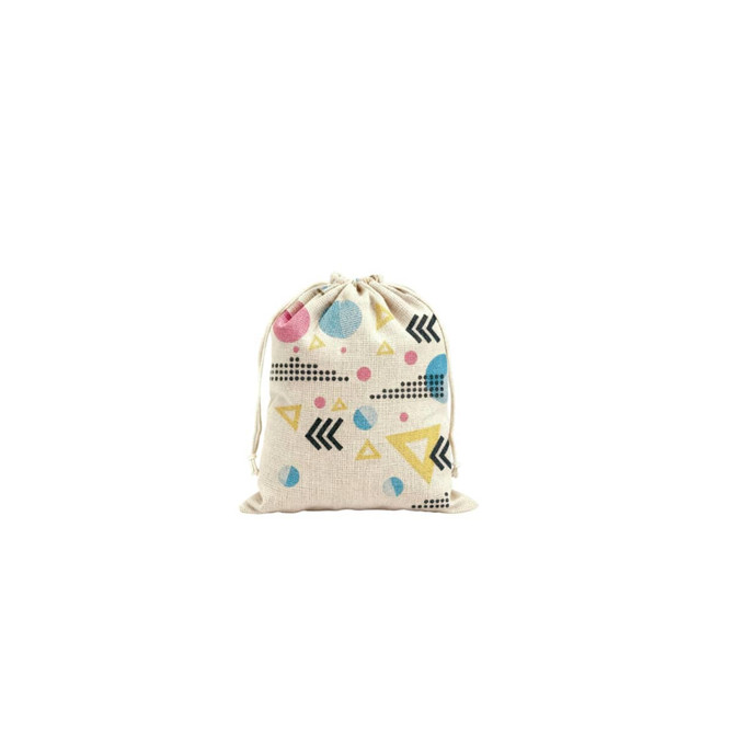 A patterned cotton linen drawstring bag featuring shapes in pink, blue, yellow, and black on a natural background.