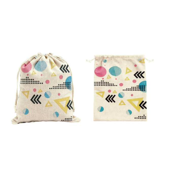 Cotton linen drawstring bags featuring a colourful geometric pattern in pink, blue, and black on a natural background.