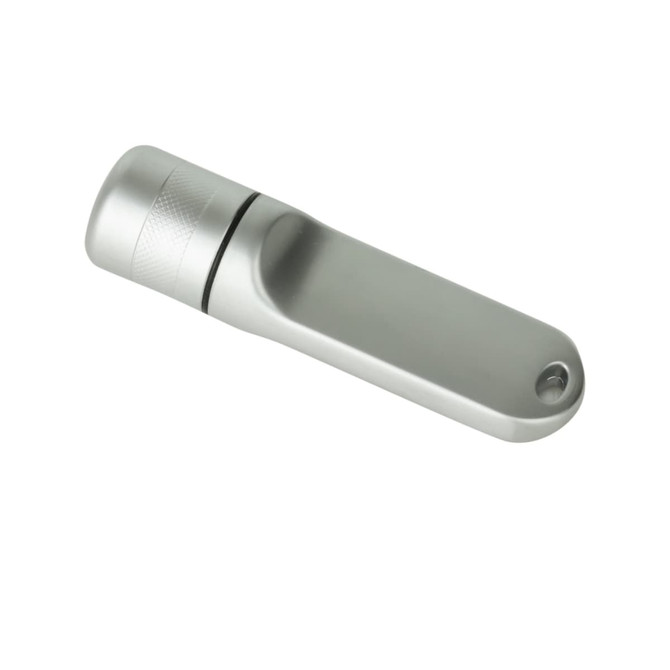 A silver flash drive with a sleek design and a branding logo on the side.