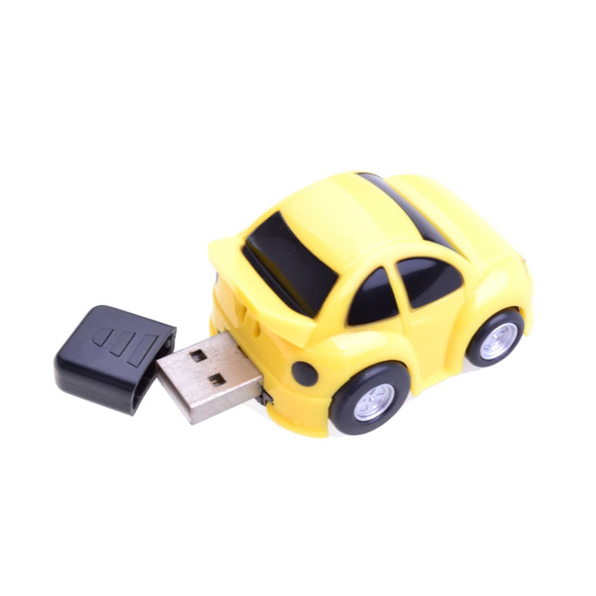 A yellow car-shaped flash drive with black accents and a USB connector protruding from the back.