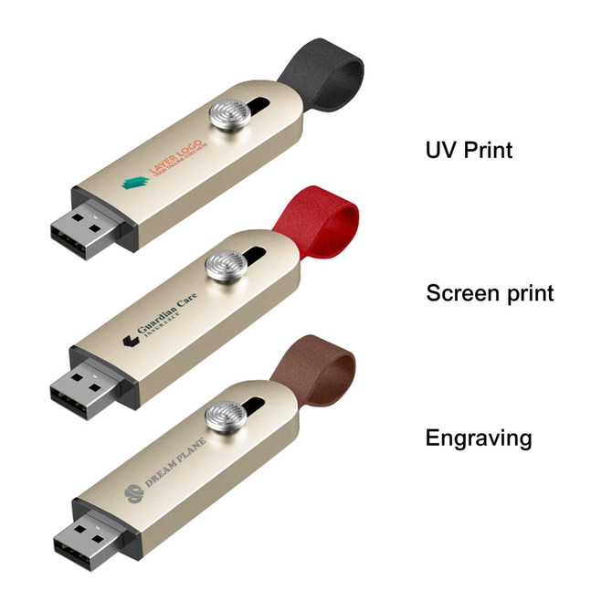 Three sliding metal flash drives in gold with various coloured straps: red, black, and brown. Each has a logo on the body.