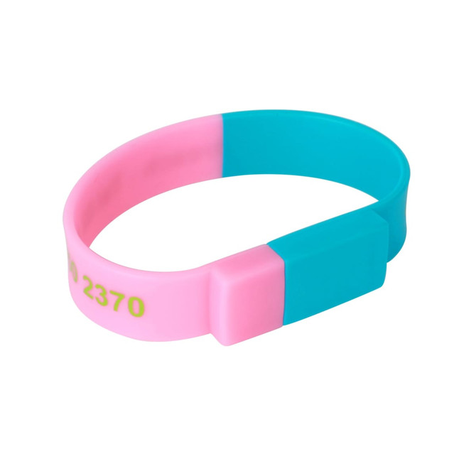 A sectional wristband flash drive in pink and turquoise, featuring a rectangular connector and a logo.