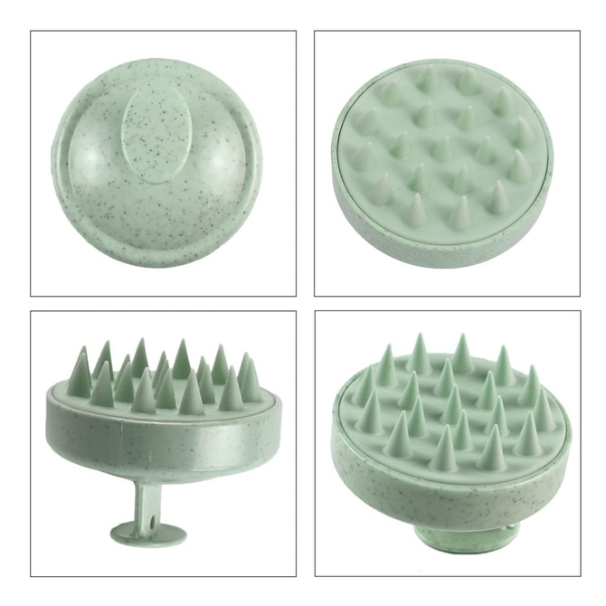 A green hair scalp massager with textured surfaces for gentle stimulation. Features a circular design and a sturdy handle.