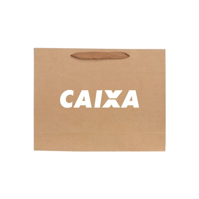 A large brown paper bag with fabric flat handles and a logo on the front.