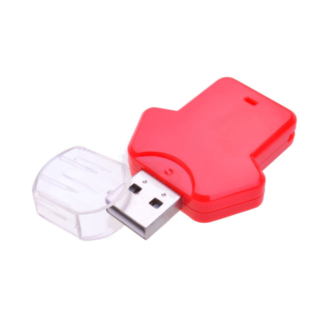 A red flash drive shaped like a tee shirt, with a clear cap covering the USB connector.