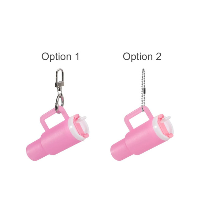 A pink mini tumbler keyring with a handle and a detachable chain, featuring a white lid. Includes a branding logo.