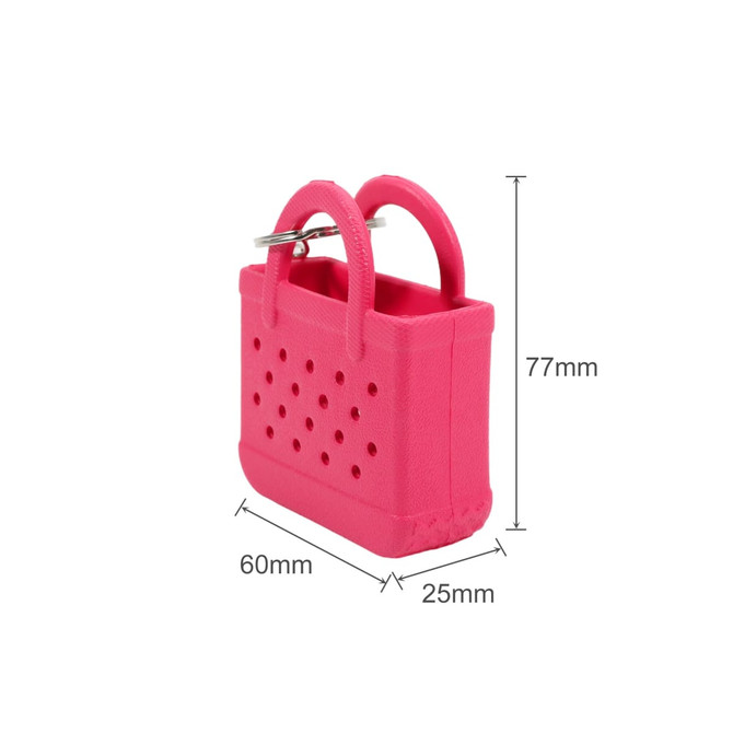 A pink Mini EVA holes bag keychain with two handles and a silver keyring, measuring 77mm by 60mm by 25mm.