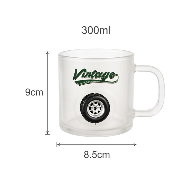 A frosted glass mug featuring a tyre design and a logo, with dimensions of 300ml capacity.