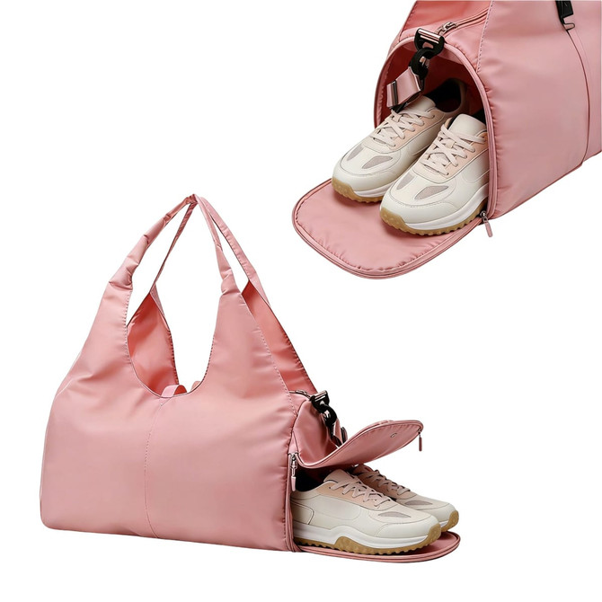 A pink duffle bag featuring a compartment for shoes, designed with a stylish handle and a zippered opening.