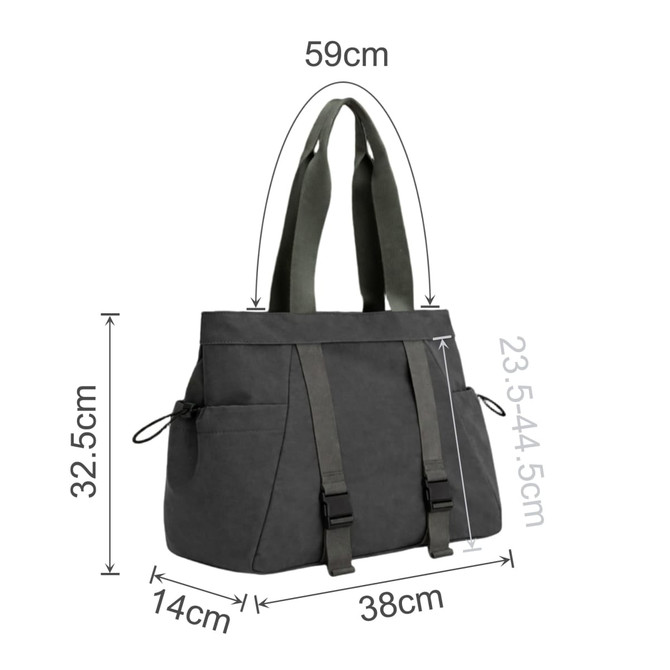 A lightweight tote bag in dark grey with adjustable yoga mat straps and multiple pockets. It has a logo on the front.