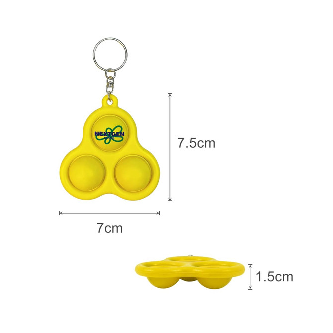 A yellow keychain with three poppable bubble-like buttons and a logo. Dimensions are 7.5 cm by 7 cm.