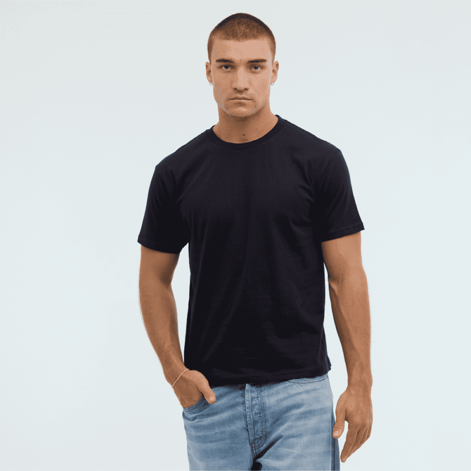 A black t-shirt with a crew neckline, displayed on a model wearing light blue jeans. The shirt features a logo.