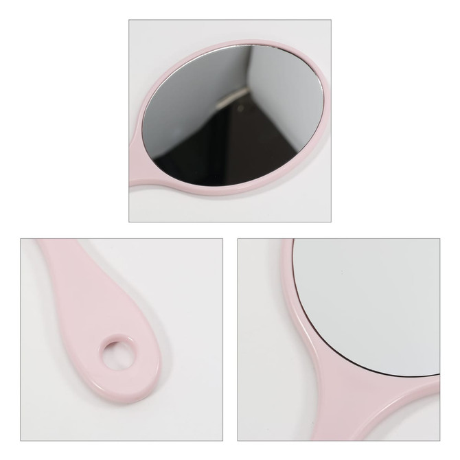 A pink handheld makeup mirror with an oval reflective surface and a looped handle. The design is chic and compact.