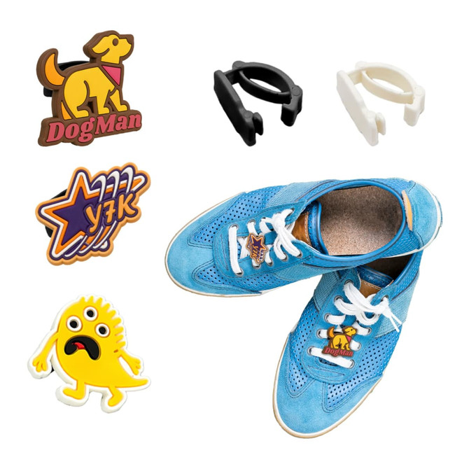 Custom shoelace charms in various colours, including a dog design and other shapes, alongside blue sneakers.