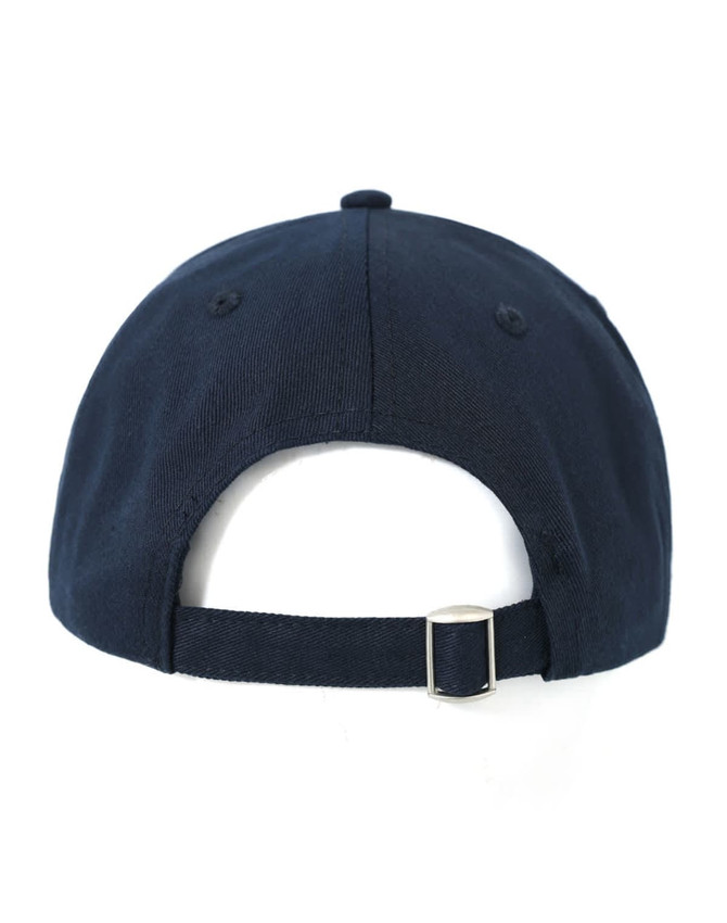 A navy unstructured cotton twill cap featuring a metal buckle closure and ventilation eyelets.