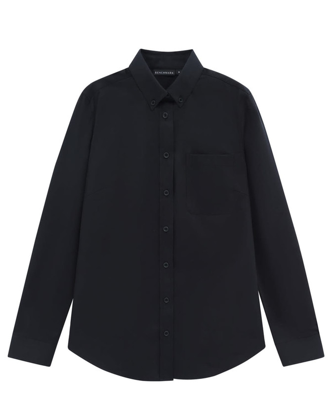 A black long-sleeve shirt with a button-down collar and a single chest pocket. The shirt features branding.