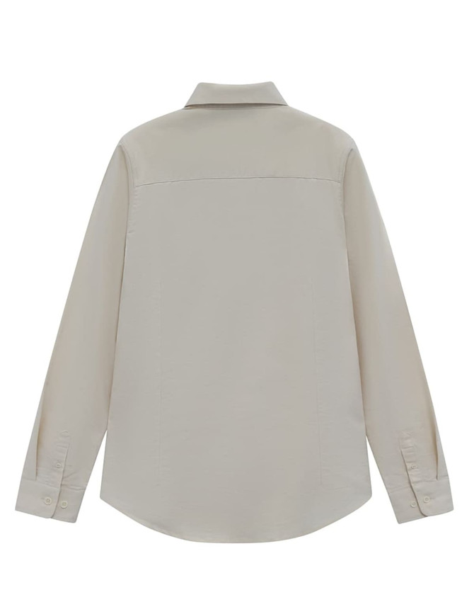 A light beige long-sleeve cotton blend shirt with a collar and buttoned cuffs, featuring a logo.