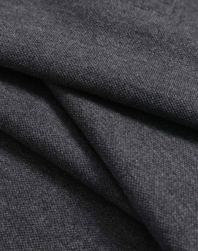 A close-up of soft, dark grey ultrafine cotton pique fabric with visible texture and folds.
