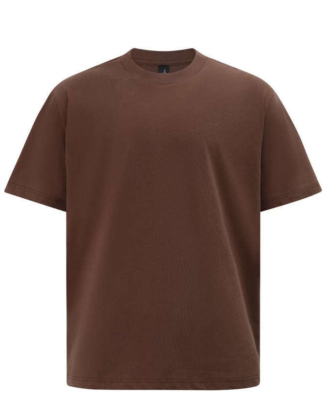 A brown oversized unisex heavy cotton tee with a relaxed fit. Features a logo on the label.