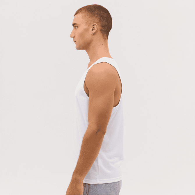 A white singlet is displayed on a model, showcasing a side profile view. The singlet features a simple design with no visible logos.