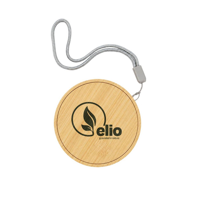 A round bamboo wireless charger with a grey strap and an embossed logo.