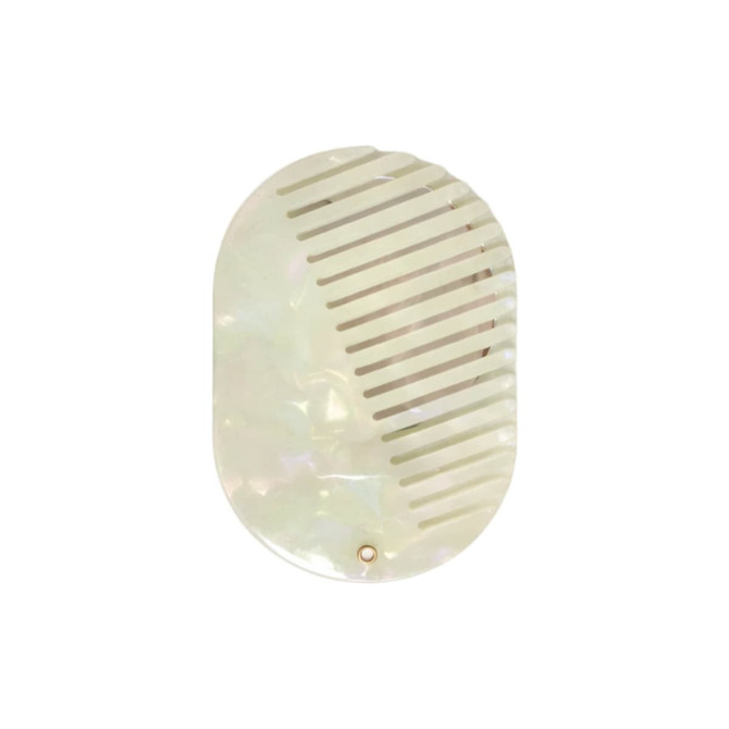 A portable acetate hair comb with a mirror, featuring an iridescent, pearlescent finish.