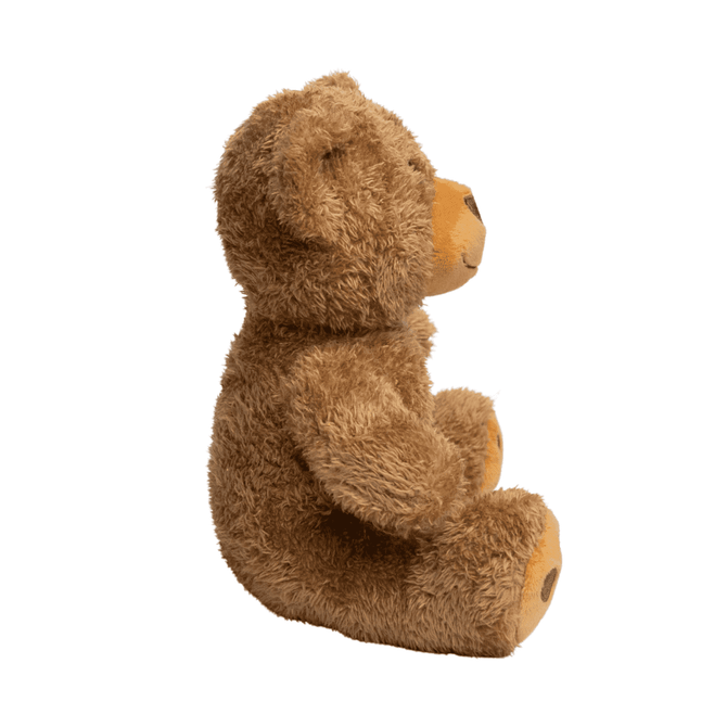 A fluffy brown teddy bear plush toy with a smiling face, sitting upright, featuring light tan accents.