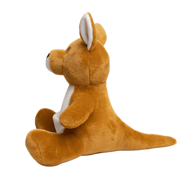 A plush kangaroo toy, primarily brown with a white belly, sits upright, showcasing its large ears and tail.