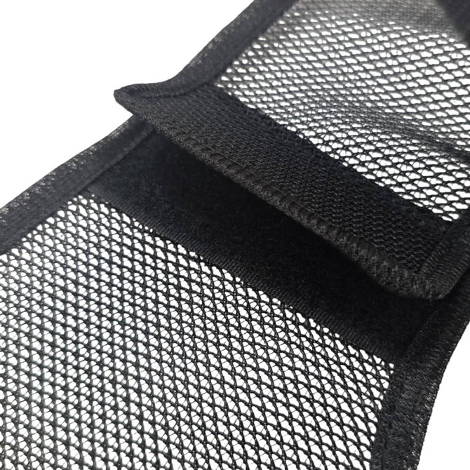 A black mesh fabric with a velcro fastening. The material is lightweight and has a textured pattern.