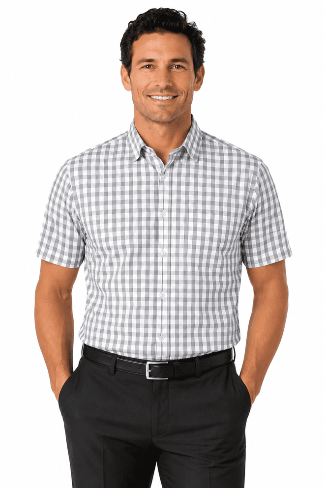 A short-sleeve checkered shirt in shades of grey and white, featuring a collar and button-up front, worn by a man.