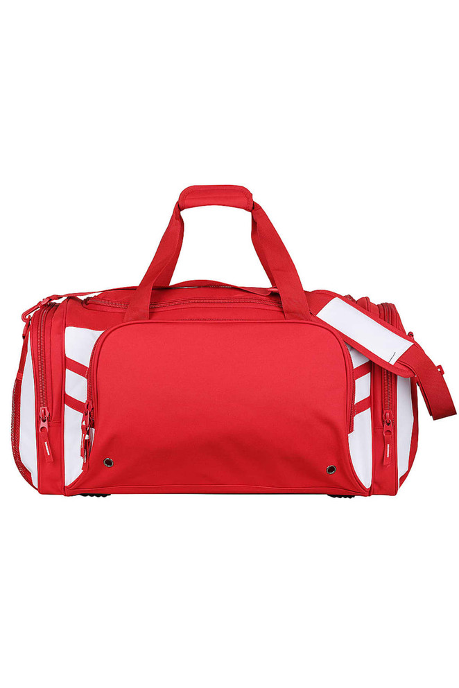 A red duffle bag with contrasting white accents and a logo. It features two handles and a detachable shoulder strap.