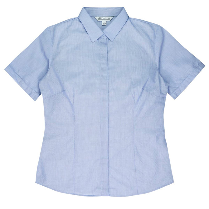 A short-sleeve button-up shirt in light blue with a fitted design, featuring a collar and branding.