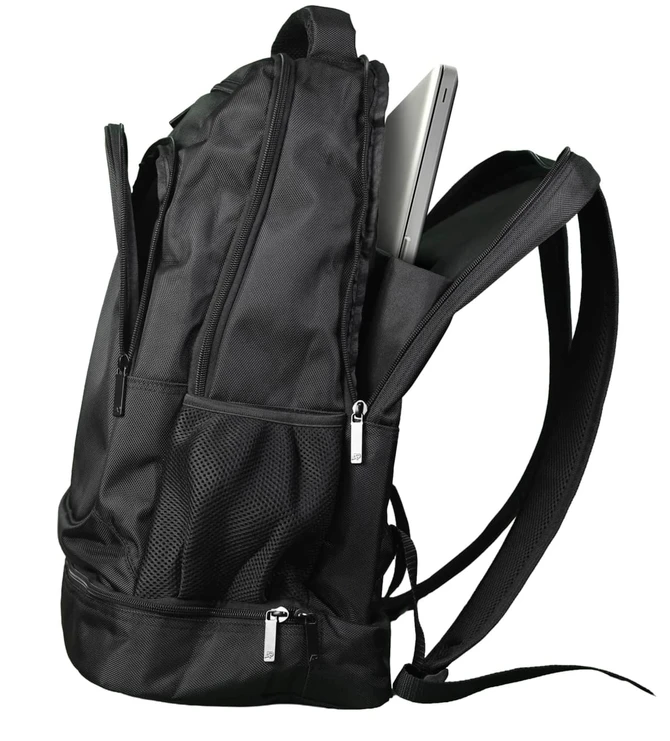A black backpack featuring multiple zippered compartments and mesh pockets, with a laptop partially visible inside.