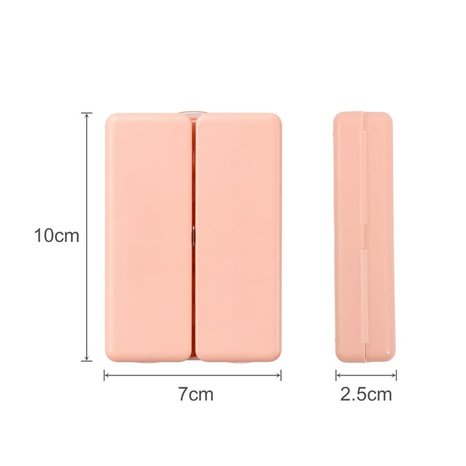 A pink folding pill box with seven compartments, measuring 10 cm by 7 cm by 2.5 cm, featuring a logo.