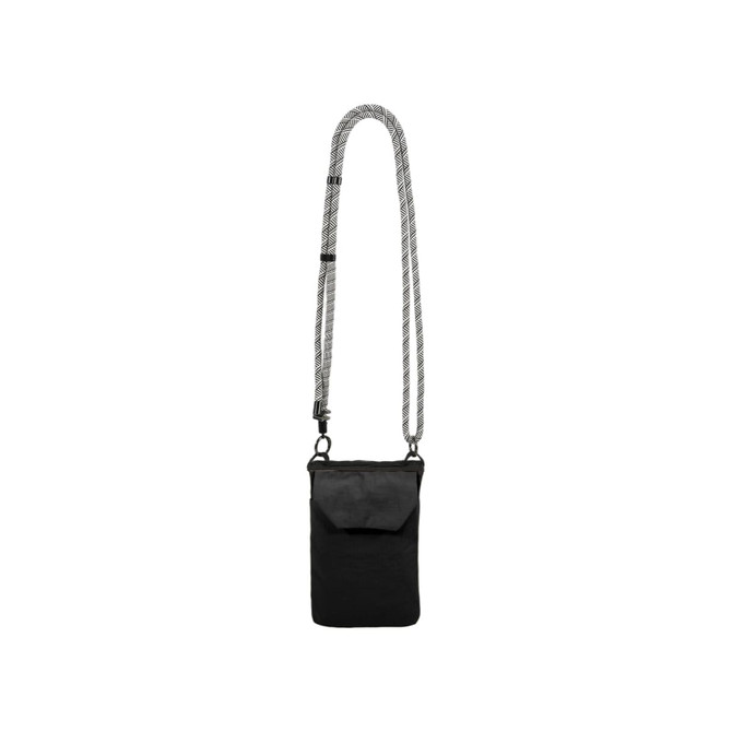 A black minimalist crossbody phone bag with a patterned strap, featuring a front flap and one logo.