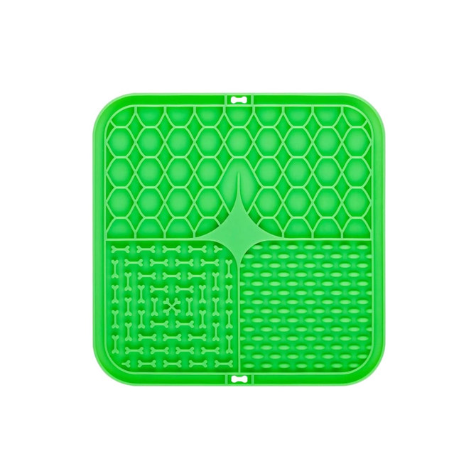 A green, three-section dog enrichment lick mat featuring various textured patterns, including hexagons and bones.