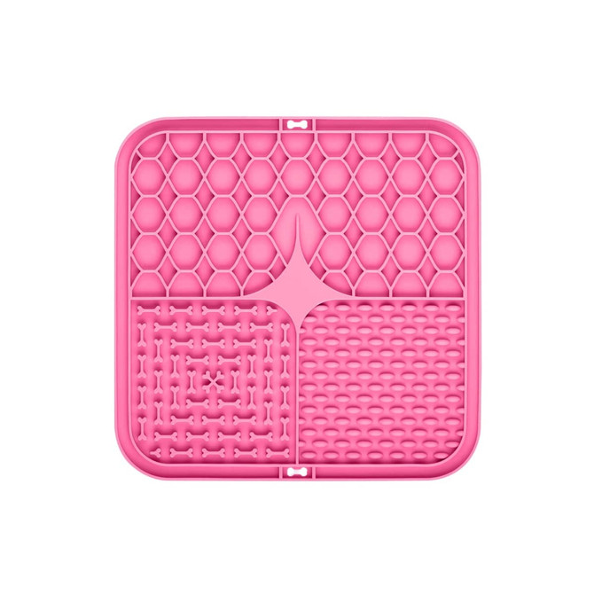 A pink, three-section dog enrichment lick mat featuring various textured patterns for interactive play.
